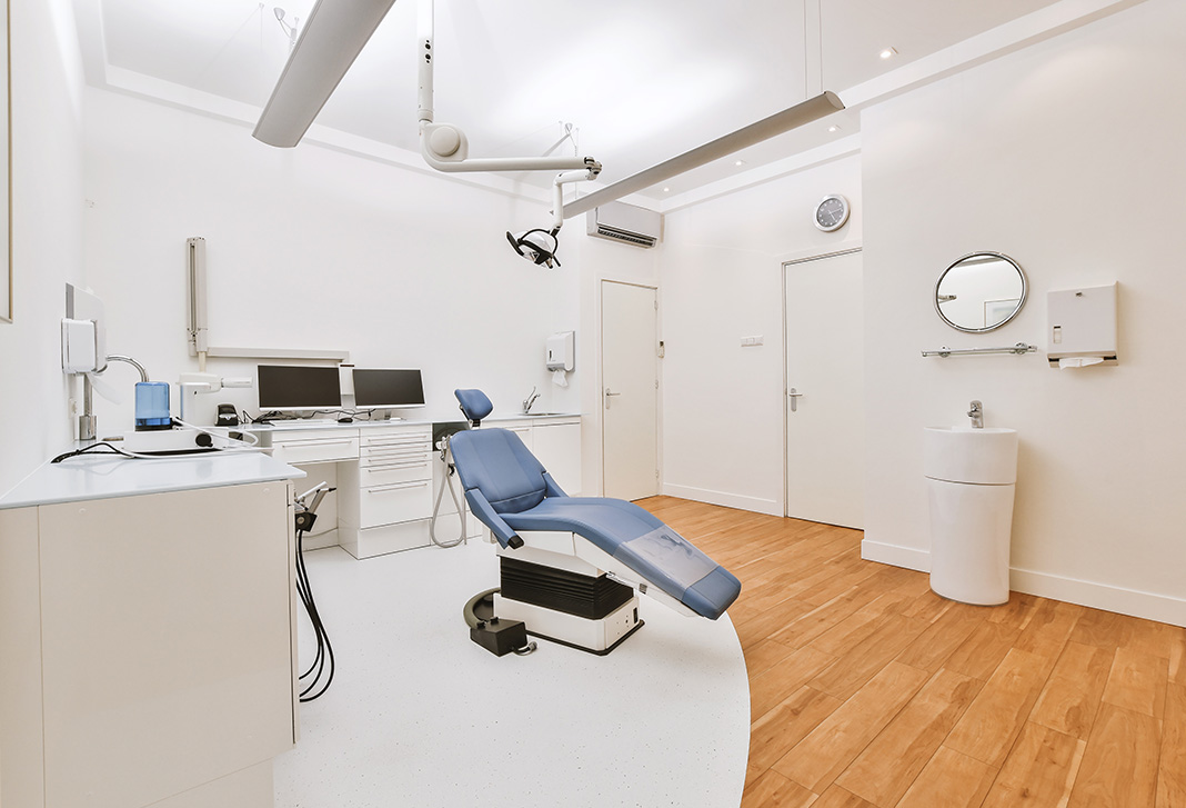 Modern dentist office interior, white and beige